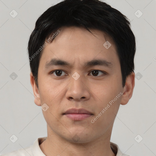 Neutral white young-adult male with short  black hair and brown eyes