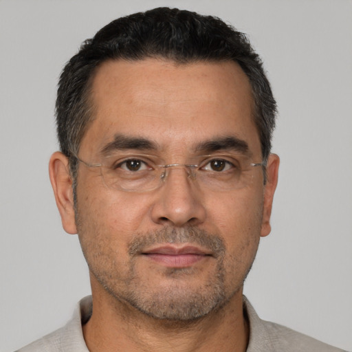 Neutral white adult male with short  black hair and brown eyes
