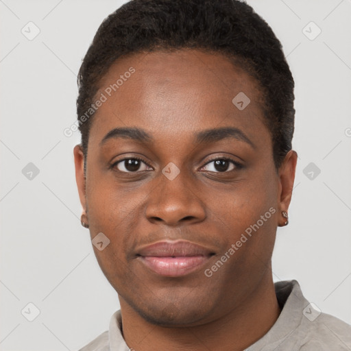 Joyful black young-adult female with short  brown hair and brown eyes