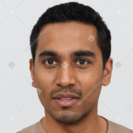 Neutral latino young-adult male with short  black hair and brown eyes