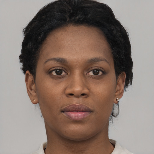 Neutral black young-adult female with short  brown hair and brown eyes