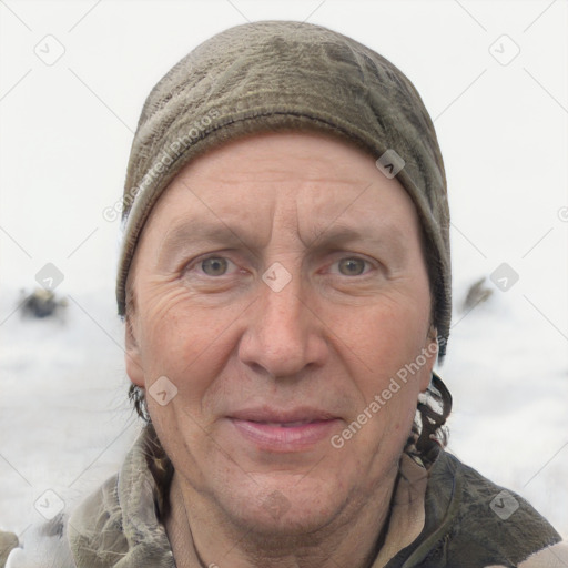 Joyful white adult male with short  brown hair and grey eyes