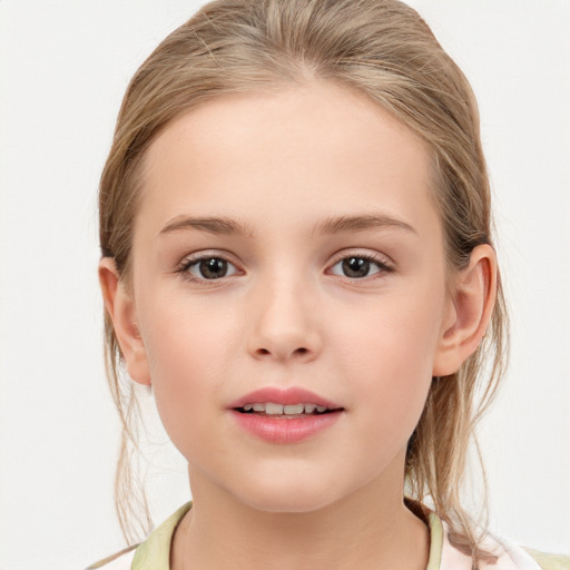 Joyful white child female with medium  brown hair and grey eyes