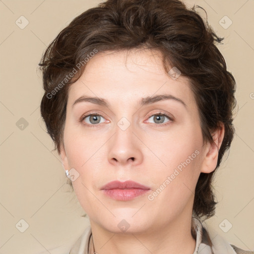 Neutral white young-adult female with medium  brown hair and green eyes