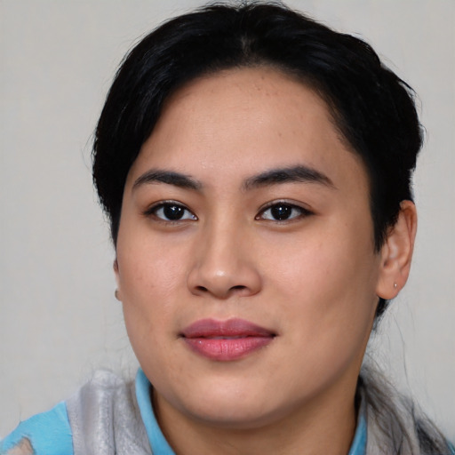 Joyful asian young-adult female with medium  black hair and brown eyes