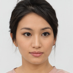 Neutral asian young-adult female with medium  brown hair and brown eyes