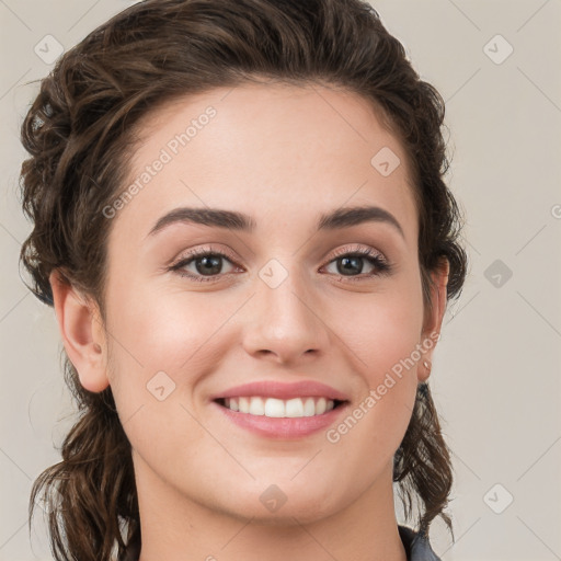 Joyful white young-adult female with medium  brown hair and green eyes