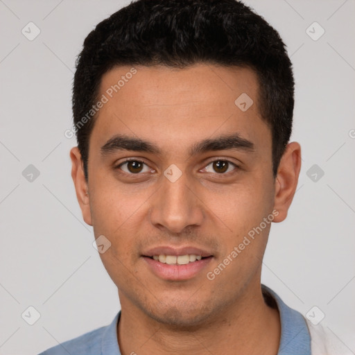 Joyful white young-adult male with short  black hair and brown eyes