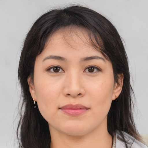 Joyful asian young-adult female with medium  brown hair and brown eyes