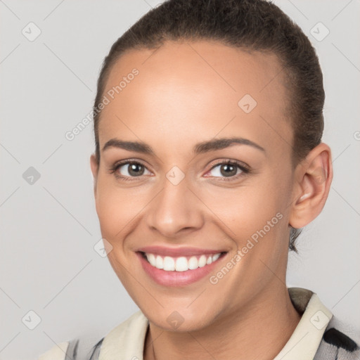 Joyful white young-adult female with short  brown hair and brown eyes