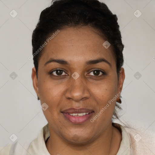 Joyful black adult female with short  brown hair and brown eyes