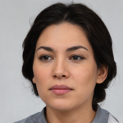 Neutral asian young-adult female with medium  brown hair and brown eyes