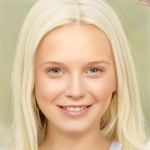 Joyful white young-adult female with long  blond hair and brown eyes