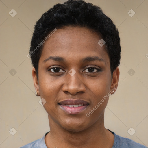 Joyful black young-adult female with short  black hair and brown eyes