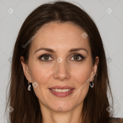 Joyful white adult female with long  brown hair and brown eyes