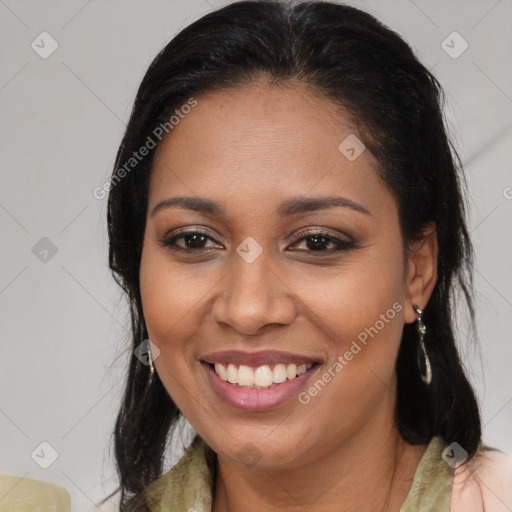 Joyful latino young-adult female with medium  brown hair and brown eyes