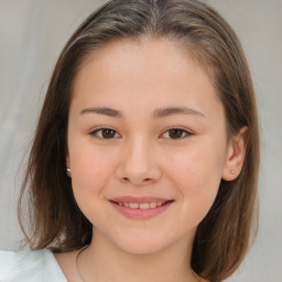 Joyful white child female with medium  brown hair and brown eyes