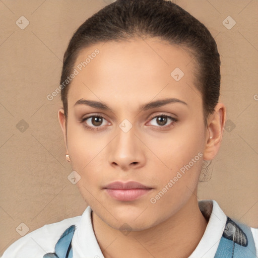 Neutral white young-adult female with short  brown hair and brown eyes