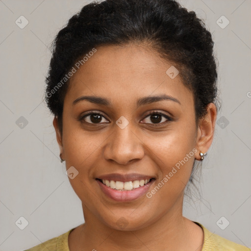 Joyful latino young-adult female with short  brown hair and brown eyes