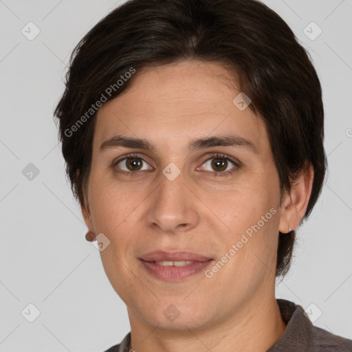 Joyful white adult female with short  brown hair and brown eyes