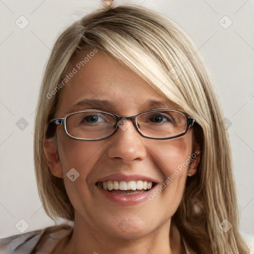 Joyful white young-adult female with long  brown hair and blue eyes