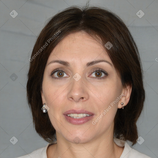 Joyful white adult female with medium  brown hair and brown eyes