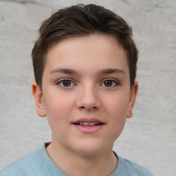 Joyful white child female with short  brown hair and brown eyes