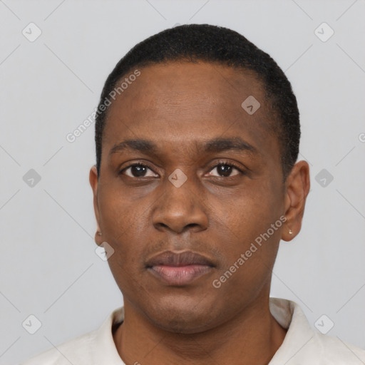 Neutral black young-adult male with short  black hair and brown eyes