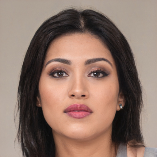 Neutral asian young-adult female with long  brown hair and brown eyes