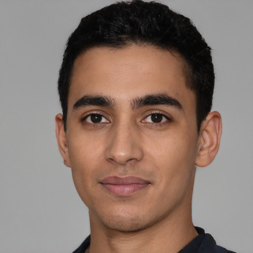 Neutral latino young-adult male with short  black hair and brown eyes