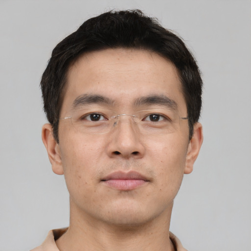 Neutral asian young-adult male with short  brown hair and brown eyes