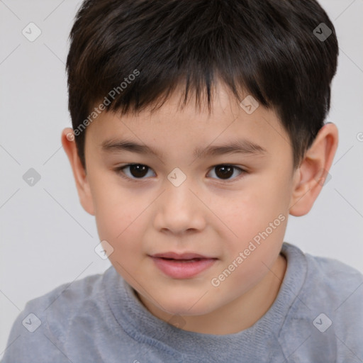 Joyful white child male with short  brown hair and brown eyes