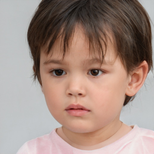 Neutral white child female with short  brown hair and brown eyes
