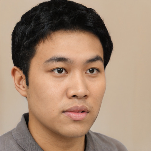 Neutral asian young-adult male with short  black hair and brown eyes