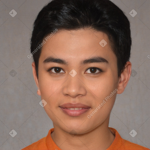 Joyful asian young-adult male with short  black hair and brown eyes