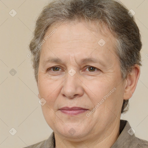 Joyful white middle-aged female with short  brown hair and brown eyes