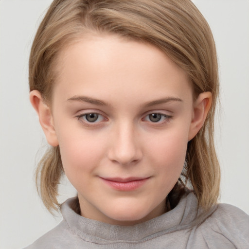 Joyful white child female with medium  brown hair and grey eyes