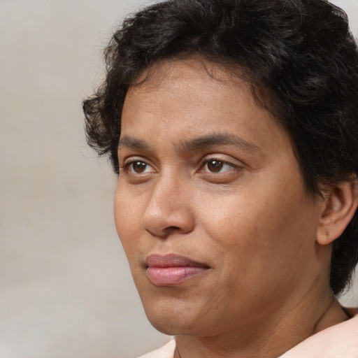 Neutral white adult female with short  brown hair and brown eyes