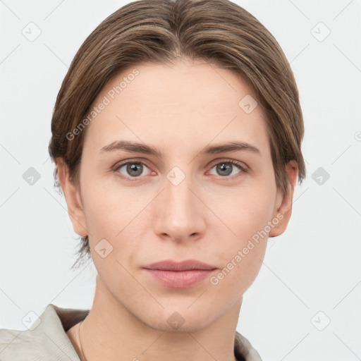 Joyful white young-adult female with short  brown hair and grey eyes