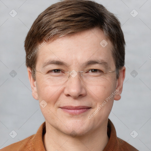 Joyful white adult male with short  brown hair and grey eyes