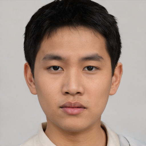 Neutral asian young-adult male with short  black hair and brown eyes