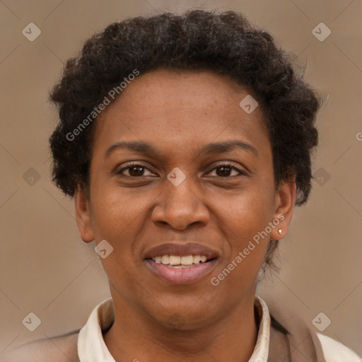 Joyful black adult female with short  brown hair and brown eyes