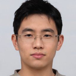 Neutral asian young-adult male with short  brown hair and brown eyes