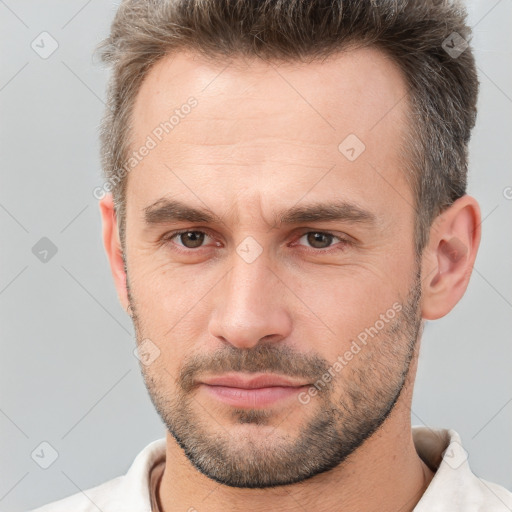 Neutral white adult male with short  brown hair and brown eyes