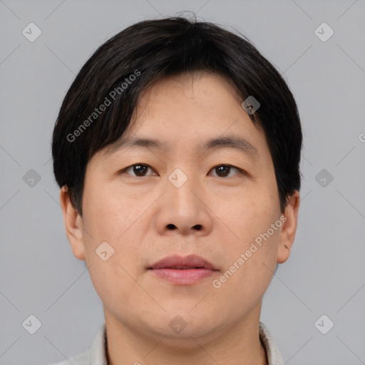 Neutral asian young-adult male with short  brown hair and brown eyes