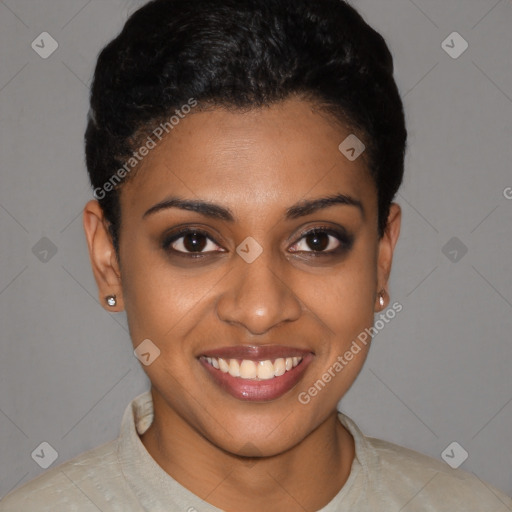 Joyful black young-adult female with short  brown hair and brown eyes