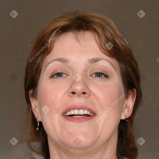 Joyful white adult female with medium  brown hair and grey eyes