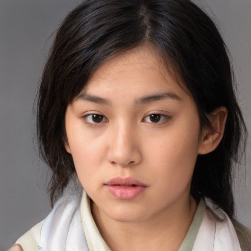 Neutral asian young-adult female with medium  brown hair and brown eyes