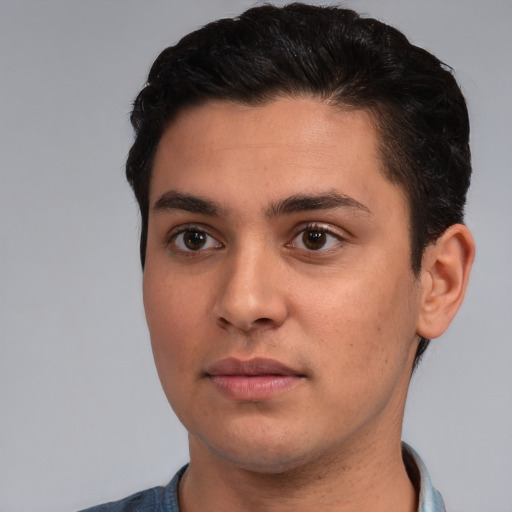 Neutral white young-adult male with short  black hair and brown eyes