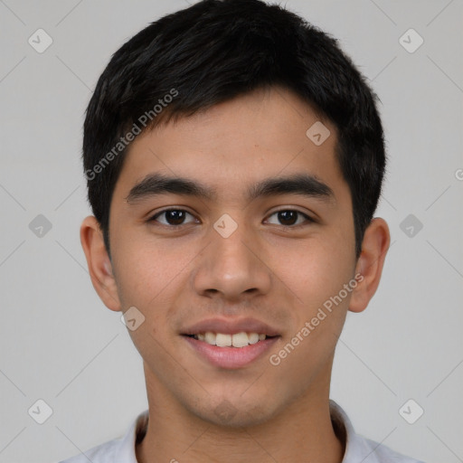 Joyful asian young-adult male with short  black hair and brown eyes